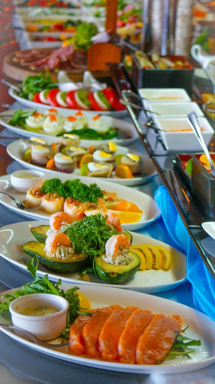 A full catered buffet line of plated dishes