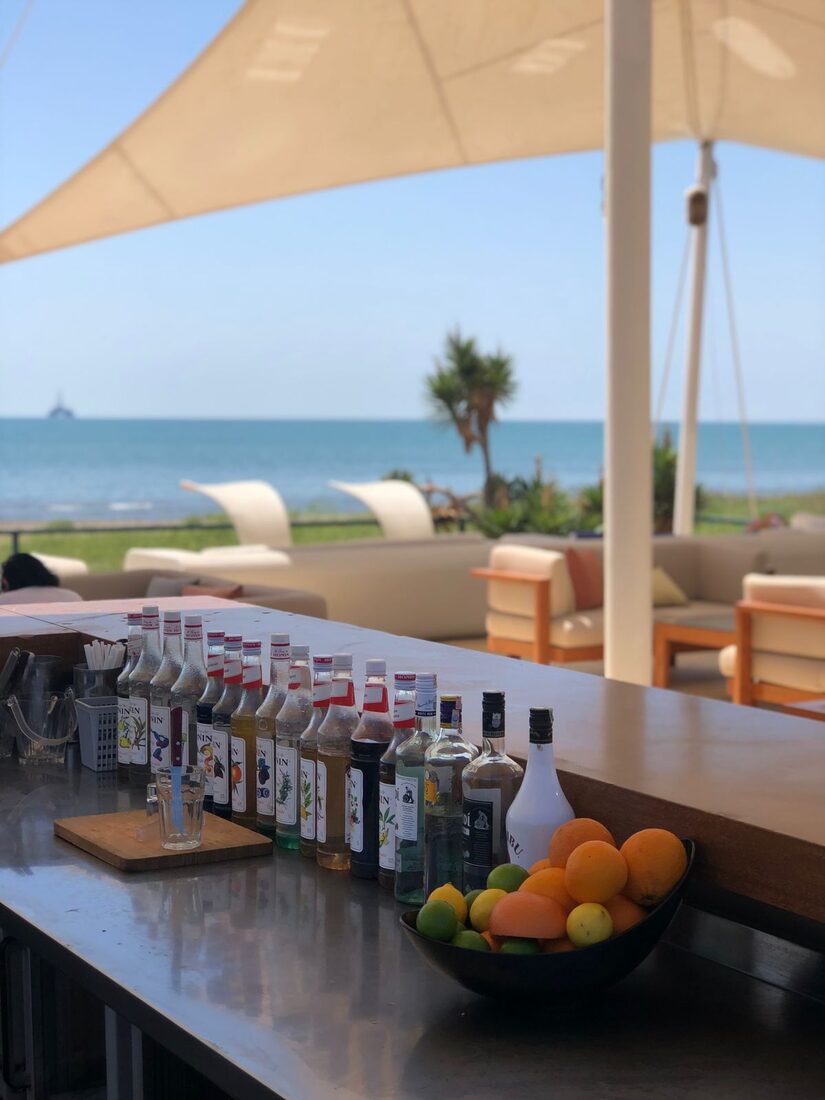 Sea-view terrace dining by the outdoor pool