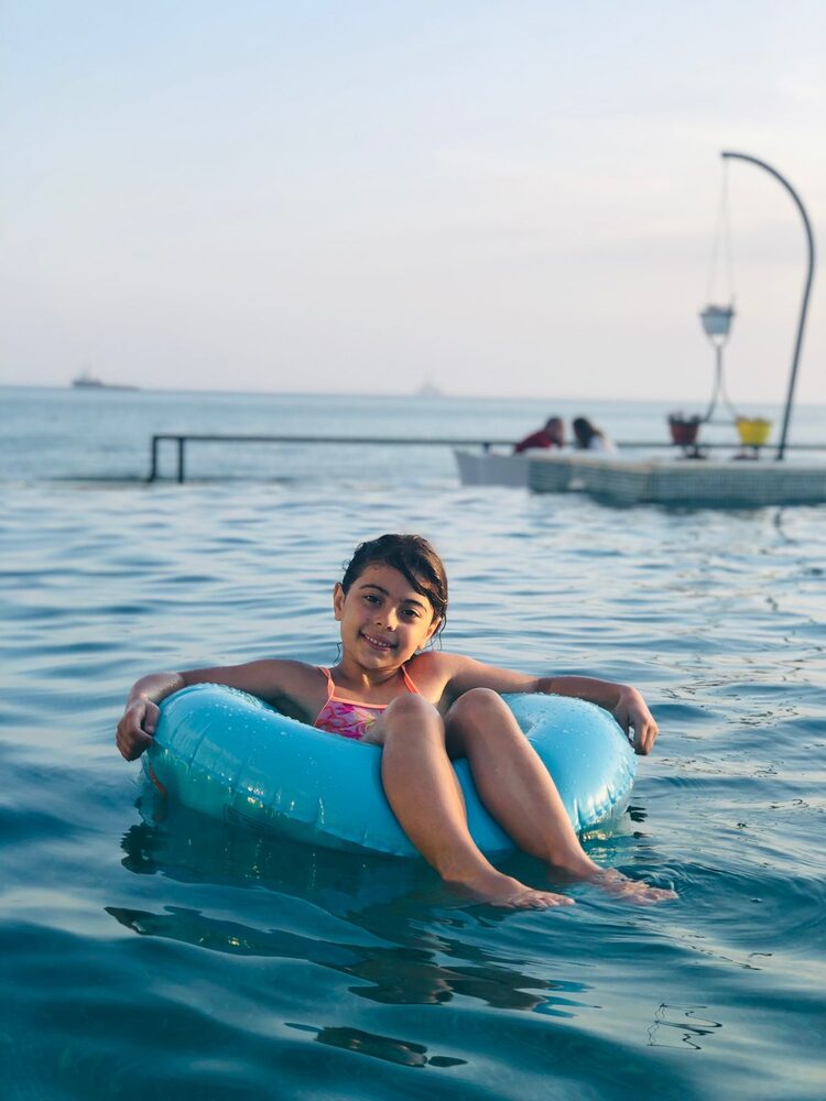 Swimming by the sea